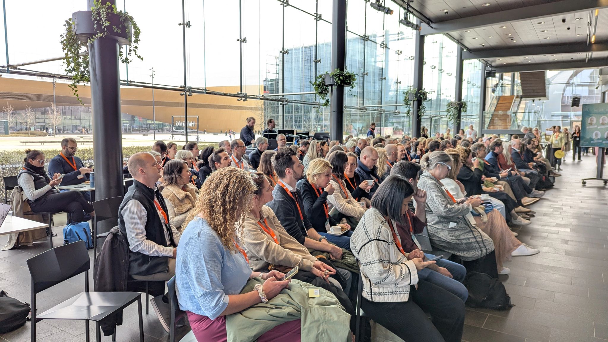 Audience attending the conference at the Helsinki Music Hall
